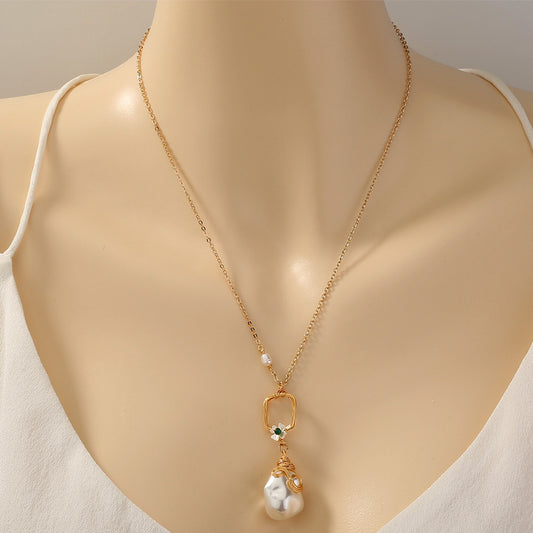 Make a statement with our Fashion Women's Pearl Earrings Pendant Necklace.